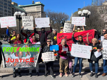 New York City Mumia Abu-Jamal supporters protest.