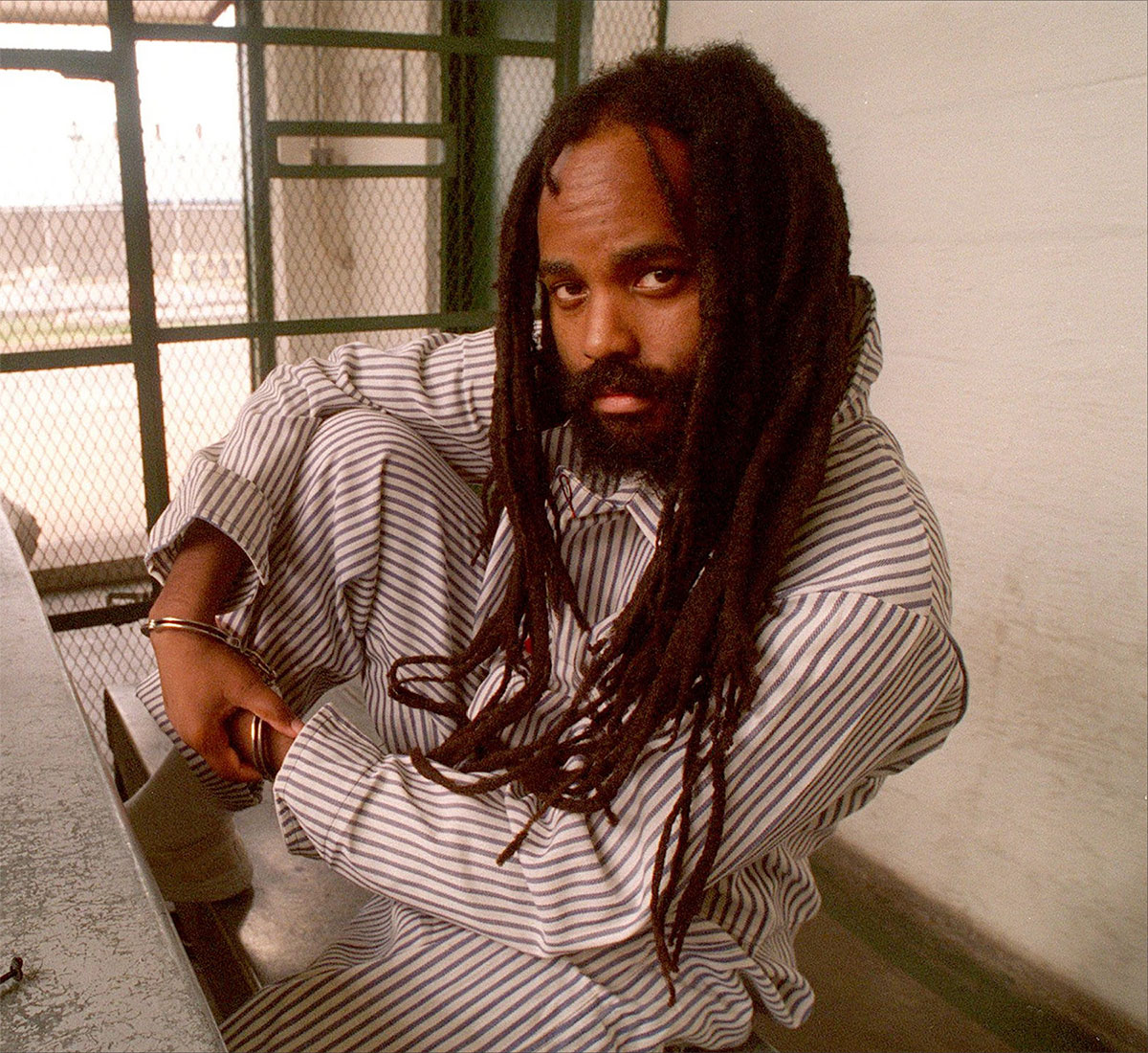 Mumia Abu Jamal in pinstripes. Photograph: April Saul/April Saul / Philadelphia Inquirer